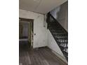 Old wooden staircase in a home undergoing renovation at 1207 W 35Th St, Indianapolis, IN 46208