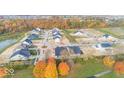 Aerial view of new homes and community with pond at 4991 Elaine Ct, Noblesville, IN 46062