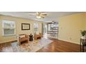 Bright living room with hardwood floors and kitchen views at 6369 River Valley Way, Indianapolis, IN 46221