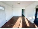 Spacious living room featuring hardwood floors and ample natural light at 1016 E 29Th St, Anderson, IN 46016