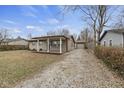 Updated Ranch home with covered porch and gravel driveway at 4019 Alberta St, Indianapolis, IN 46222