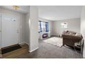 Spacious living room featuring a cozy fireplace and plush sofa at 3125 N Tacoma Ave, Indianapolis, IN 46218