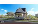 Covered community entrance with Hampton Walk signage and green space at 7344 W County Road 600, McCordsville, IN 46055