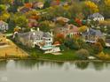 Luxury home with pool and lakefront location in fall at 8804 Waterside Dr, Indianapolis, IN 46278