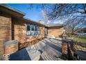 Brick facade with covered entryway and patio area at 4258 Redman Dr, Greenwood, IN 46142