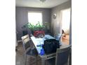 Casual dining area with table and chairs, adjacent to living room at 2307 N Catherwood Ave, Indianapolis, IN 46219