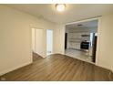 Open living room with hardwood floors, kitchen view at 2342 Hoyt Ave, Indianapolis, IN 46203