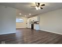 Eat-in kitchen with white cabinets and vinyl flooring at 5140 W 34Th St, Indianapolis, IN 46224