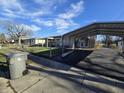 House with carport and a fenced yard at 1925 Dayton Ave, Indianapolis, IN 46203