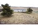 House with deck and large backyard, surrounded by fields at 4726 E 210 N, Lebanon, IN 46052