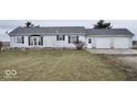 Ranch home with attached two-car garage and large yard at 4726 E 210 N, Lebanon, IN 46052