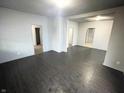 Spacious living room featuring dark gray floors at 2134 Pleasant St, Indianapolis, IN 46203