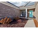 Inviting front porch with sitting area and landscaping at 5142 Citadel Dr, Noblesville, IN 46062