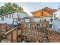 Wooden deck with patio furniture and hanging planters at 801 Spring Valley Dr, Indianapolis, IN 46231