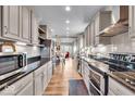 Modern kitchen with granite countertops and stainless steel appliances at 2222 E 75Th St, Indianapolis, IN 46240