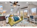 Main bedroom with a queen bed and access to a private balcony at 2222 E 75Th St, Indianapolis, IN 46240