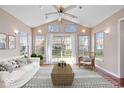 Bright sunroom with plenty of windows and access to backyard at 10787 Pimlico Cir, Carmel, IN 46280