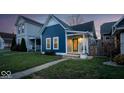 House exterior at dusk, showcasing the home's curb appeal at 1106 Linden St, Indianapolis, IN 46203