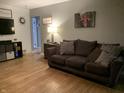 Living room with hardwood floors and a comfy sofa at 1513 Laurel Dr, Columbus, IN 47203