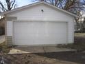 Single car garage with an overhead door at 317 N Bradley Ave, Indianapolis, IN 46201