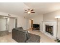 Spacious living room with fireplace and neutral decor at 3713 Oil Creek Dr, Indianapolis, IN 46268