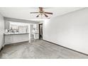 Dining room with hardwood floors and kitchen access at 409 Lansdowne Rd, Indianapolis, IN 46234