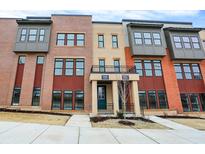 Brick townhome exterior with modern design and landscaping at 388 S Meridian Unit A-Bldg C St, Greenwood, IN 46142