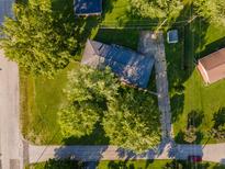 Ranch house with large yard, seen from above at 2129 Woodcrest Rd, Indianapolis, IN 46227