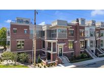 Modern brick townhouses with private balconies and steps at 679 E 16Th St, Indianapolis, IN 46202