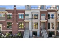 Modern brick townhouses with private entrances and landscaping at 675 E 16Th St, Indianapolis, IN 46202