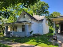 Charming bungalow with gray brick accents at 3310 N Kenwood Ave, Indianapolis, IN 46208