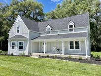 Newly renovated farmhouse with front porch at 22133 State Road 37 N, Noblesville, IN 46060