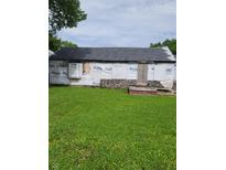 House exterior undergoing renovation with stone at 3025 S Keystone Ave, Indianapolis, IN 46237