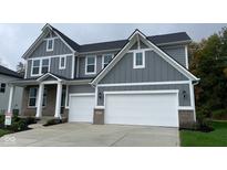 Two-story house with gray siding, white trim, and a two-car garage at 6272 Willow Branch Way, Plainfield, IN 46168