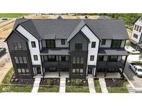 Modern townhouses with black and white exterior at 379 S Cherry St, Westfield, IN 46074