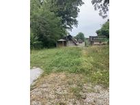 Image shows a damaged house needing repairs at 3343 S Lyons Ave, Indianapolis, IN 46221