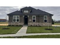Brick house with a gray roof and walkway at 1157 Paul Revere Dr, Mooresville, IN 46158