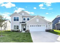 Two story home with neutral siding, white garage door, and landscaping at 19663 Atwater Ave, Sheridan, IN 46069