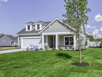 Craftsman style home with gray siding and stone accents at 11419 Neptune Dr, Fishers, IN 46040