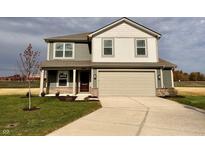 Two-story house with neutral siding and landscaping at 1126 Fleming Dr, Greenfield, IN 46140