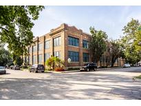 Brick building with large windows, offering ample natural light at 735 Lexington Ave # Apt 8, Indianapolis, IN 46203
