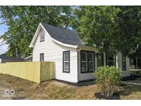 Newly renovated home with a new fence at 1046 Dawson St, Indianapolis, IN 46203