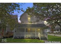 Charming two-story home with front porch at 248 N Walcott N St, Indianapolis, IN 46201