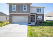 Two-story brick home with a gray accent and attached two-car garage at 168 Velvet Hat Rd, Danville, IN 46122