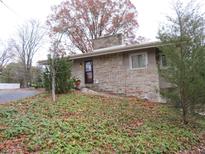 Stone house exterior with landscaping and driveway at 431 Vestal Rd, Plainfield, IN 46168