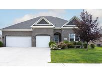 Brick house with two-car garage at 6611 Ventnor Pl, Indianapolis, IN 46217