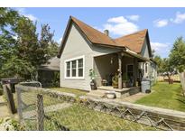 Charming craftsman home with front porch and fenced yard at 1948 W New York St, Indianapolis, IN 46222