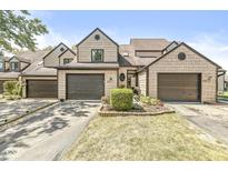 Front view of a charming two-story home with a shingled facade at 9644 Highgate N Cir, Indianapolis, IN 46250