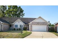 Front view of house with attached garage at 709 Silver Fox Ct, Indianapolis, IN 46217