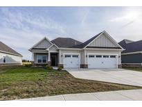 Craftsman style home with two-car garage and front porch at 1569 Tupelo Dr, Greenfield, IN 46140